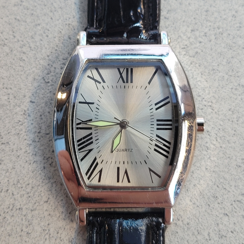 Silver dress watch in amazing condition. New battery